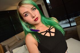 Green haired pierced teen sticks sweet Colombian ass in the air wearing thong