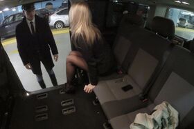 Hungarian chick in skirt and pantyhose seduces a man in back of vehicle