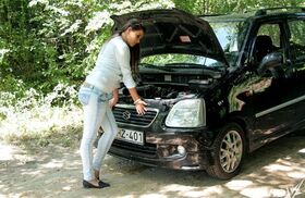 Hot ass Cindy Loarn bends over in tight jeans to suck off a guy in a garage