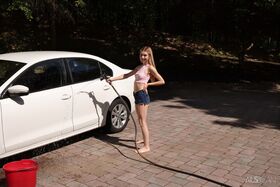 Slim teen Jessica Marie gets completely naked while washing a car in a drive