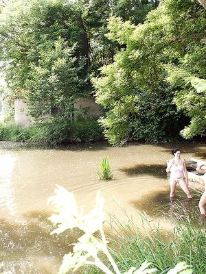 Secret Friends - Shione and her busty lesbian friend toying each other by the river