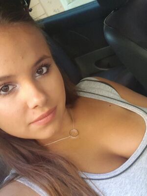 Screw Me Too - Young looking Latina girl Olivia hides her huge tits while taking selfies