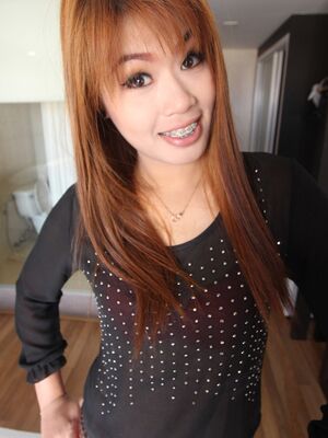 Asian Sex Diary - Chinese redhead Ming shows her braces before a POV fuck begins