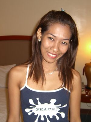 Trike Patrol - Asian first timer makes her nude debut on top of white bed sheets