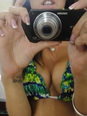 Real Exgirlfriends - Hot babe Capri Cavanni takes self shots exposing big tits and body in bikini