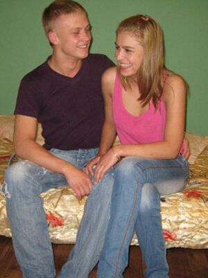 Teeny Lovers - Teen girls and their guy friend remove faded jeans before a threesome on a bed