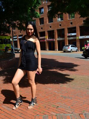 Carne Del Mercado - Long legged Colombian girl works free of a black dress for nude posing debut